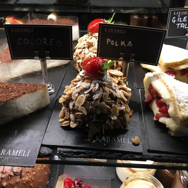 Photo taken at Karameli Cafe Bakery Cuisine by Asli I. on 5/26/2018
