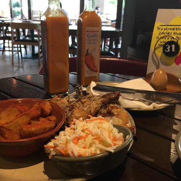 Photo taken at Nando&#39;s The Greens by Mohammad Amin a. on 4/14/2016
