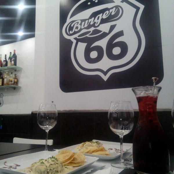 Photo taken at Burger 66 by Júlia P. on 6/4/2014