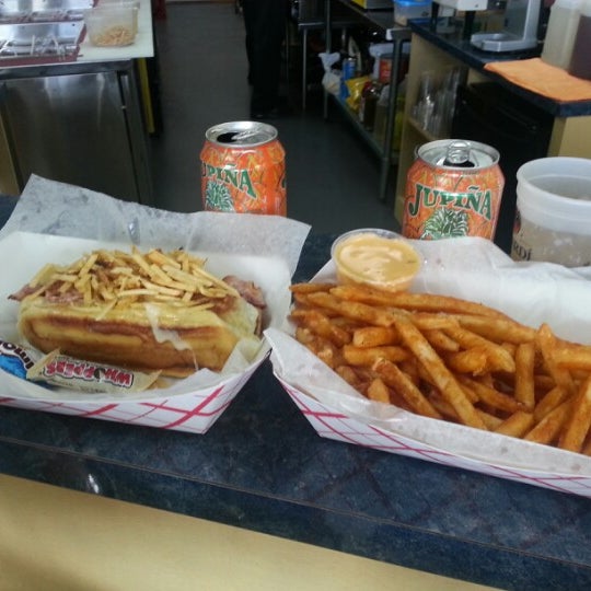 Photo taken at Sweet Dogs 305 by Alex M. on 1/12/2013