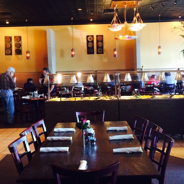 Photo taken at Cumin Indian Restaurant by Karina V. on 5/3/2014