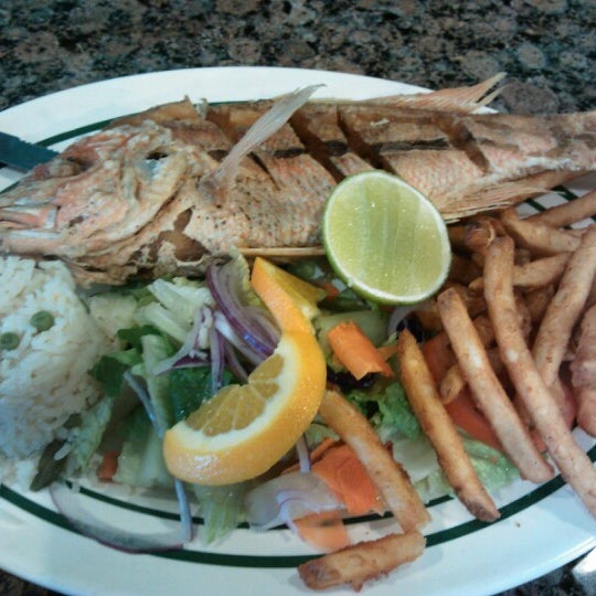 Photo taken at Alegrias Seafood Chicago by Freddy C. on 12/29/2012