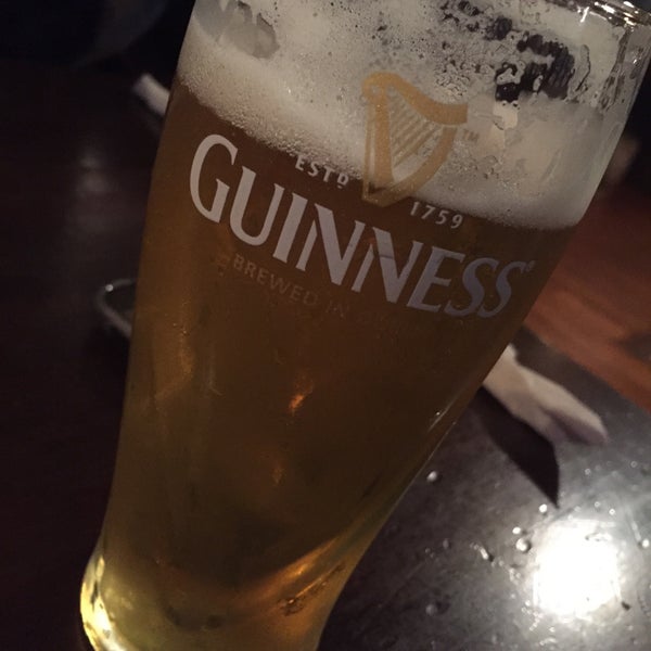 Photo taken at Quigley&#39;s Irish Pub by Greg O. on 12/23/2015