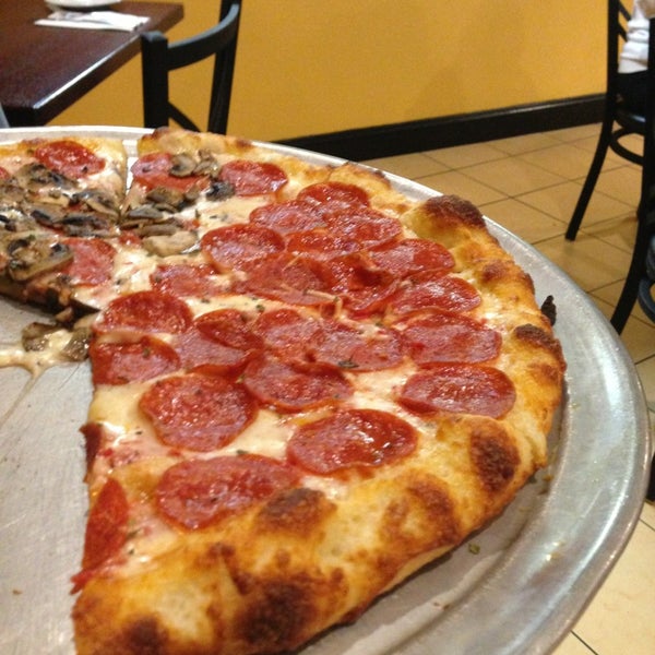Photo taken at Paradise Pizza &amp; Pasta by Jason R. on 1/7/2013
