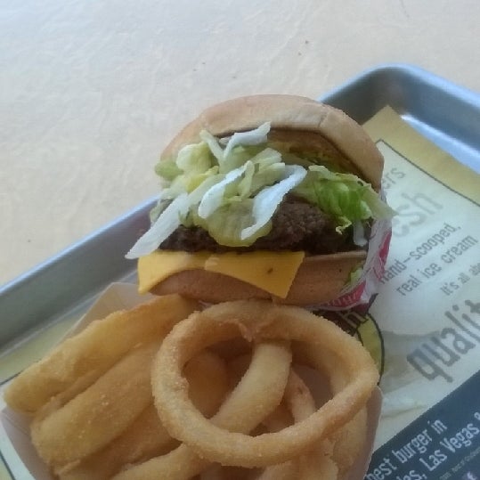 Photo taken at Fatburger by Mark H. on 5/27/2014