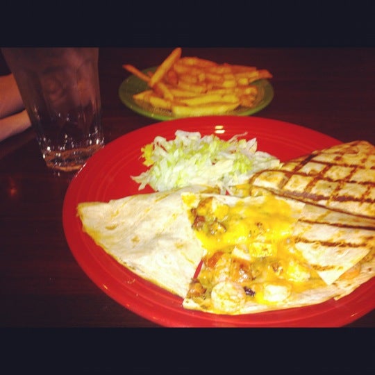 Photo taken at Nacho Mama&#39;s Mexican Grill by Aurielle B. on 12/14/2012