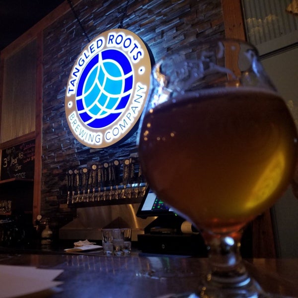 Photo taken at Tangled Roots Brewing Company by Charlie W. on 4/14/2019