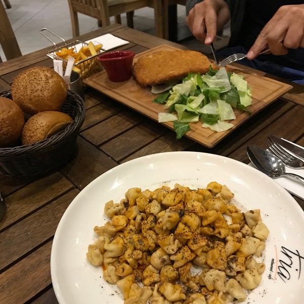 Foto diambil di Tria Restaurant Cafe oleh Sedat A. pada 10/22/2017