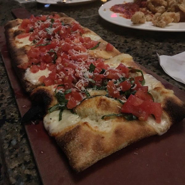 Cosimo's is known for their flatbread brickoven pizza which is out of this world. Their bar is pretty big and all the staff is very friendly. Definitely worth checking out.
