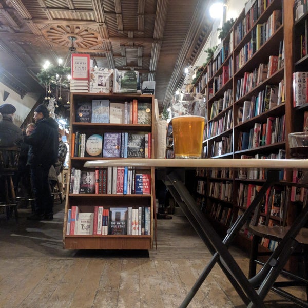 Photo taken at The Spotty Dog Books &amp; Ale by Austin W. on 12/16/2017