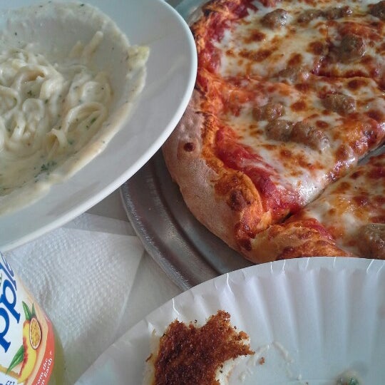 Photo taken at Deli News Pizza by Amanda D. on 2/15/2013