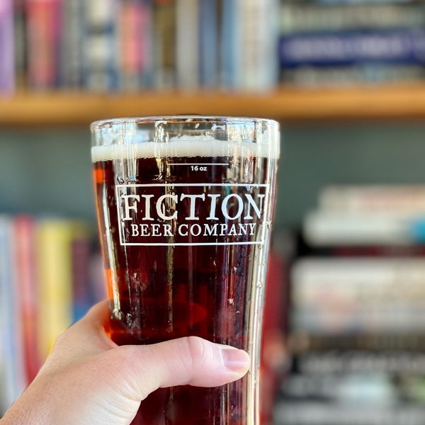 Photo taken at Fiction Beer Company by Ashley D. on 12/4/2021