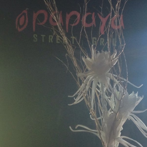 Photo taken at Papaya Street Grill by Jason T. on 2/15/2014