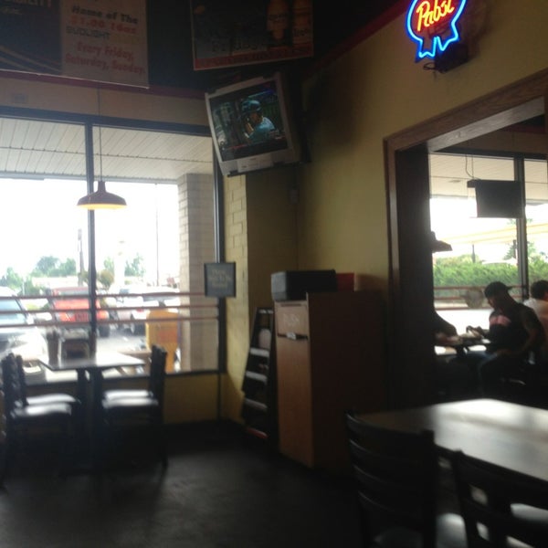 Photo taken at Wings To Go - Burlington by Brittany W. on 6/9/2013
