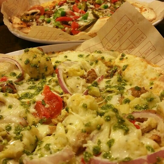 Photo taken at Mod Pizza by Stephanie S. on 3/18/2016