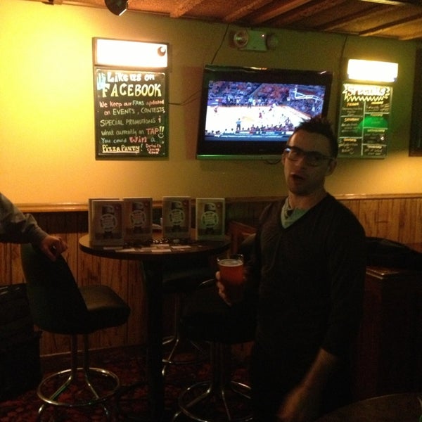 Photo taken at Boston&#39;s Bistro &amp; Pub by Eric T. on 2/8/2013