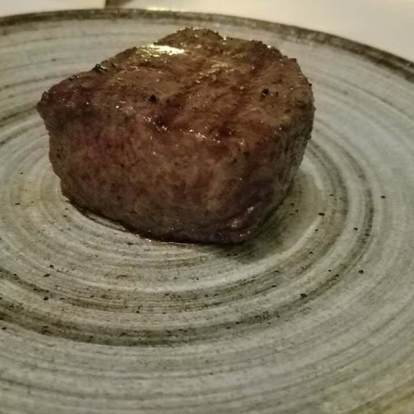 Photo taken at Alexander&#39;s Steakhouse by Angela L. on 10/3/2017