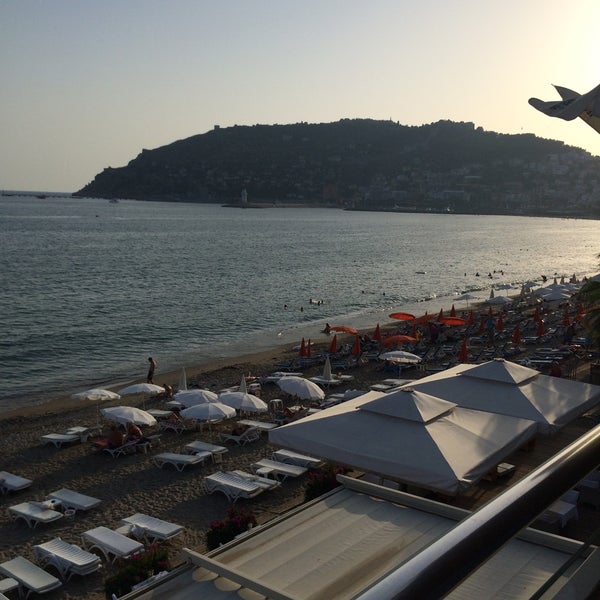 Photo taken at Güneş Beach Hotel by Özer O. on 9/15/2015