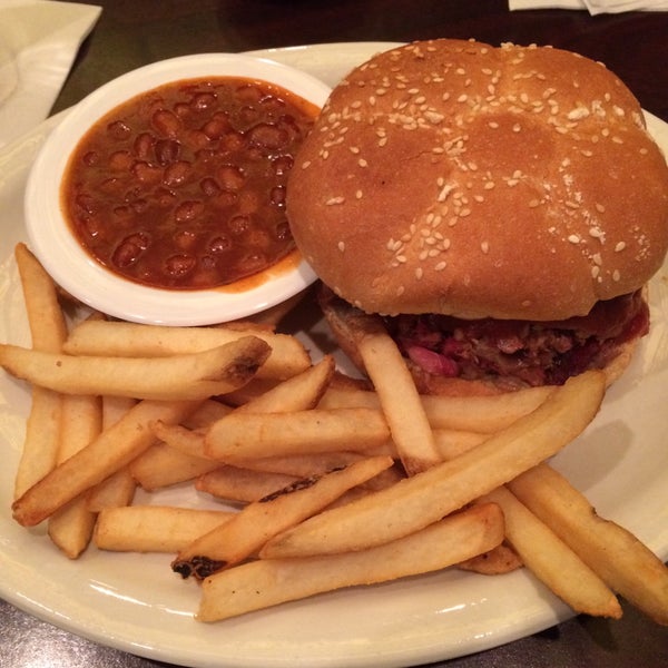 Photo taken at Smokehouse Barbecue by Stacie V. on 3/6/2015