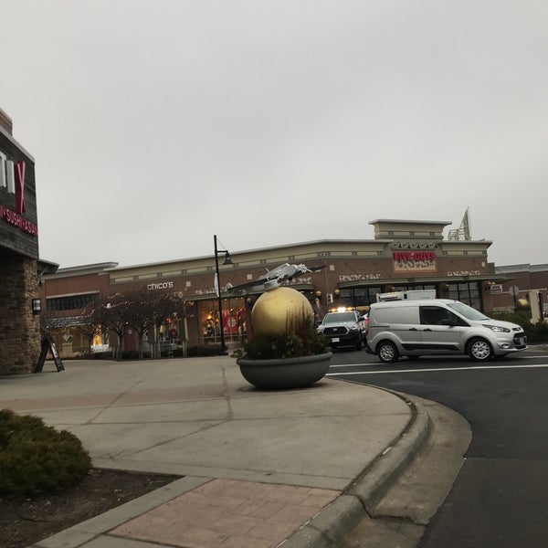 Photo taken at Legends Outlets Kansas City by Sean P. on 12/19/2018