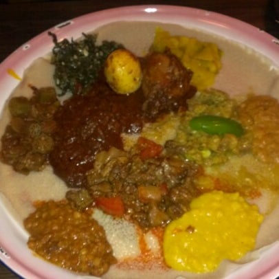 Photo taken at Queen Sheba Ethiopian Restaurant by Rachel B. on 11/26/2012