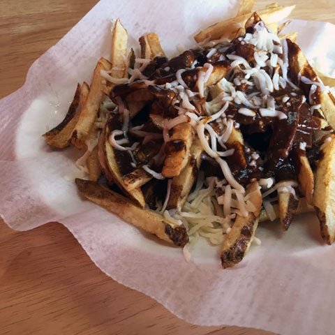 Both the fries and the moles are house-made, and the mole poblano (ask for the mole poblano de chipotle if you like spicy) is poured on without going overboard, so the fries don't get soggy.