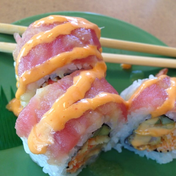 Photo taken at KiKu Revolving Sushi by Laura R. on 1/3/2014