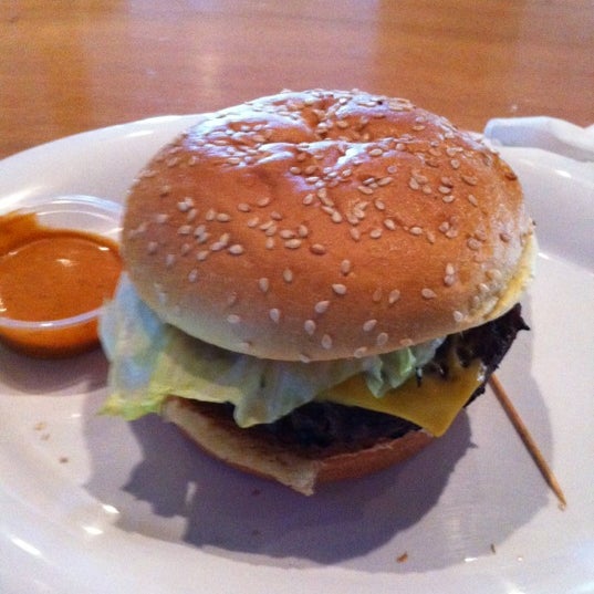 Photo taken at CG Burgers-Merrick by Takendra Luvindariusnked K. on 4/21/2012