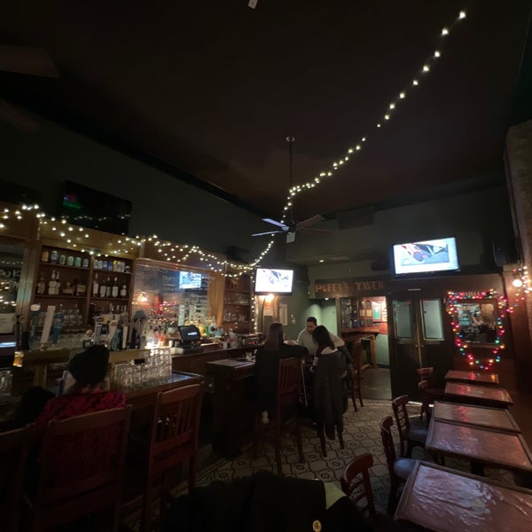 Photo taken at Puffy&#39;s Tavern by Bebo G. on 12/29/2021