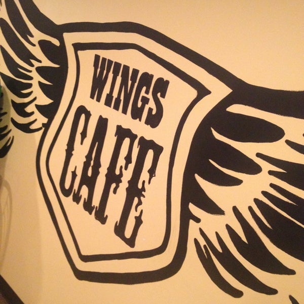 Photo taken at Wings Cafe by Chad E. on 3/4/2013