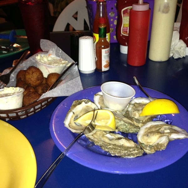 Photo taken at Bimini&#39;s Oyster Bar and Seafood Cafe by Won L. on 12/26/2012