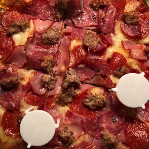 Carnivoro pizza. Pepperoni, sausage and ham. Small, $22.