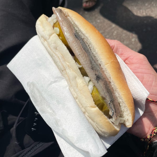 Street market. Try the famous herring sandwich (with pickled and raw onions).