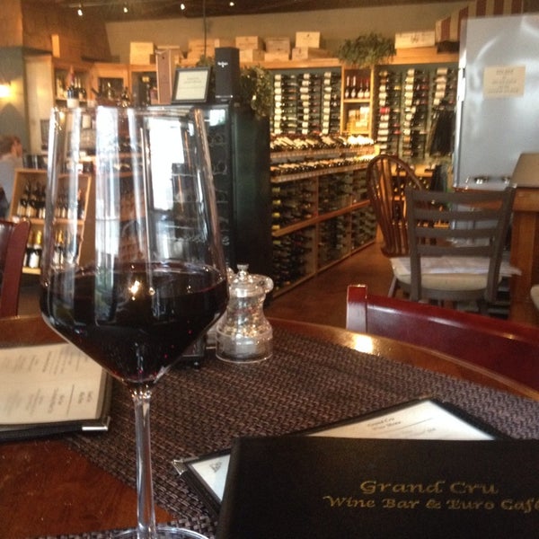 Photo taken at Grand Cru Wine Bar and Cafe by Eden E. on 3/28/2014