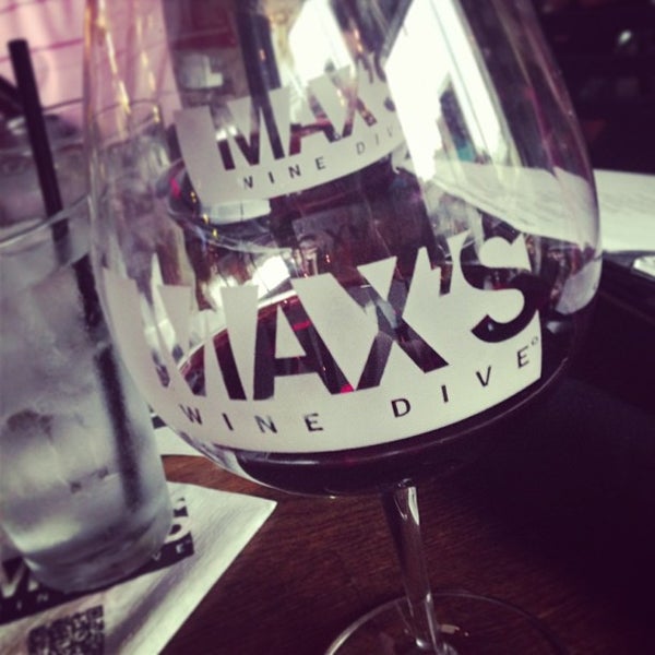 Photo taken at MAX&#39;s Wine Dive Austin by Rebecca D. on 4/27/2013