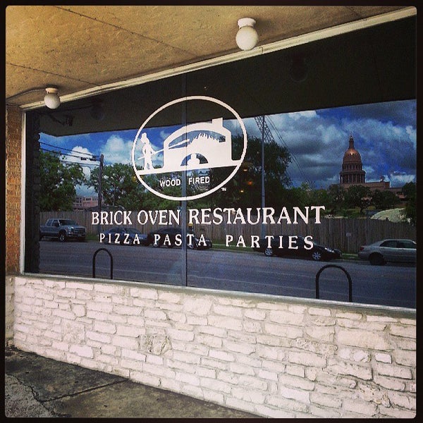 Photo taken at Brick Oven Restaurant by K Z. on 6/11/2013