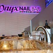 Photo taken at Onyx Nail Bar by Yext Y. on 4/10/2018