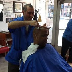 Photo taken at Little Joe &amp; John&#39;s Barber Shop by Yext Y. on 9/2/2017
