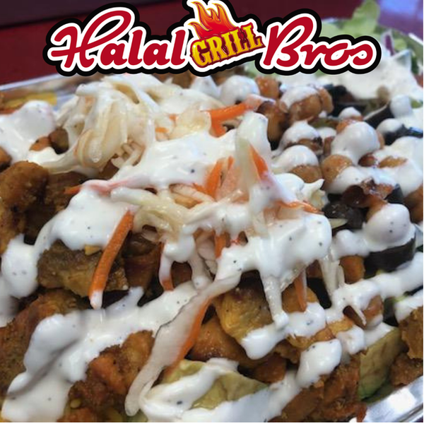 Photo taken at Halal Bros Grill by Yext Y. on 4/27/2019