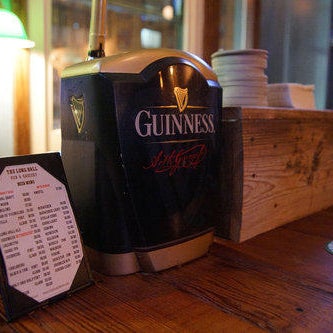 Photo taken at The Long Hall Pub &amp; Grocery by Yext Y. on 3/12/2020