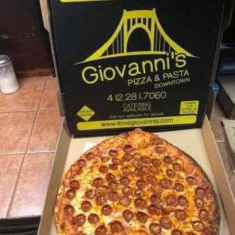 Photo taken at Giovanni&#39;s Pizza and Pasta by Yext Y. on 3/2/2018