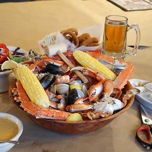 Photo taken at Blue Claw Seafood &amp; Crab Eatery by Yext Y. on 9/13/2018