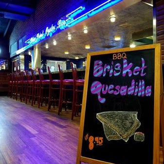 Photo taken at Aw Shucks Oyster Bar &amp; Arcade by Yext Y. on 6/15/2020
