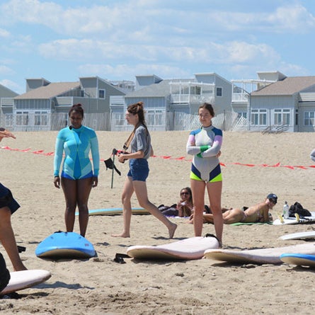 Head to Rockaway Beach with a few adventurous buddies for a beachside surf lesson with Locals Surf School.