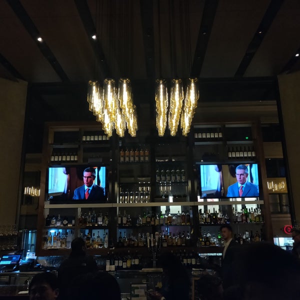 Photo taken at OneUP Restaurant &amp; Lounge by Alejandra M. on 3/23/2019