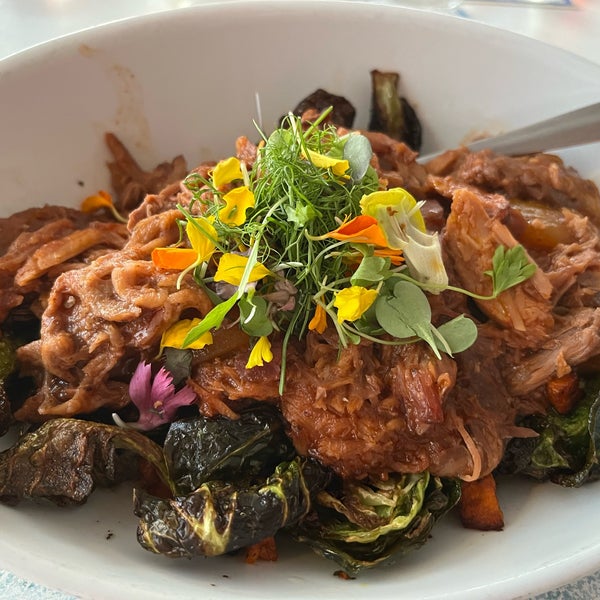 Littleneck claims with bacon and tomatoes are awesome!!  BBQ Wild Boar pulled pork with sweet potatoes, orange marmalade, and Brussels sprouts was amazing. Best dish on the menu.