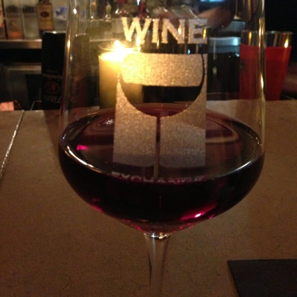 Photo taken at Wine Exchange Bistro and Wine Bar by Heather S. on 1/5/2013