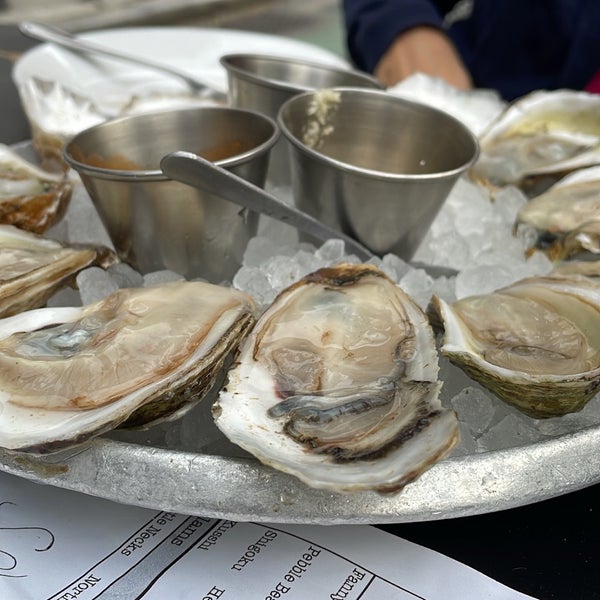 Happy hour is now $12 for 6 oysters and a beer. Best deal in town.