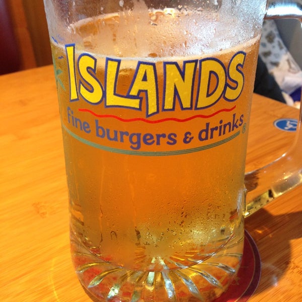 Photo taken at Islands Restaurant by Carlos S. on 6/4/2013