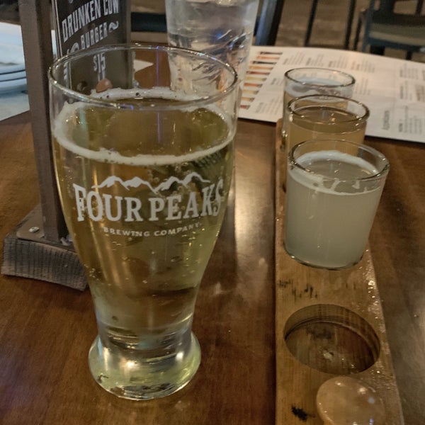 Photo taken at Four Peaks Grill &amp; Tap by Christopher W. on 5/20/2019